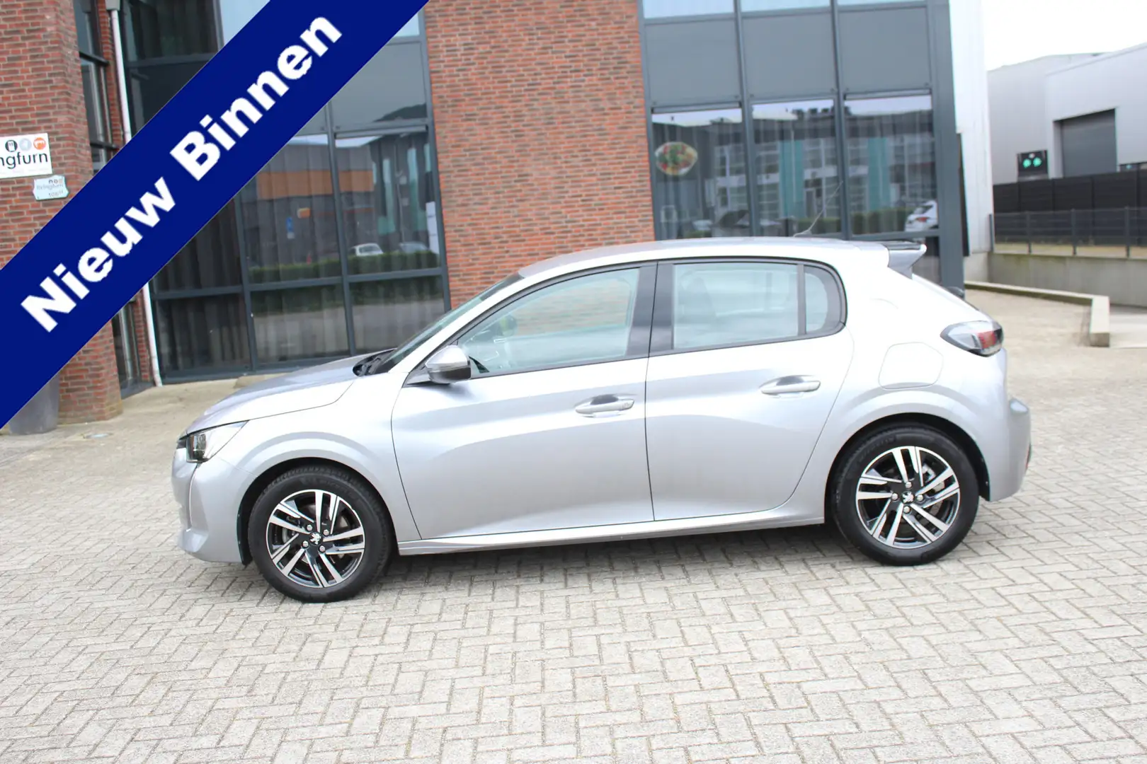 Peugeot 208 1.2 PureTech Allure Automaat Clima-Cruise-Navi-Car Gris - 1