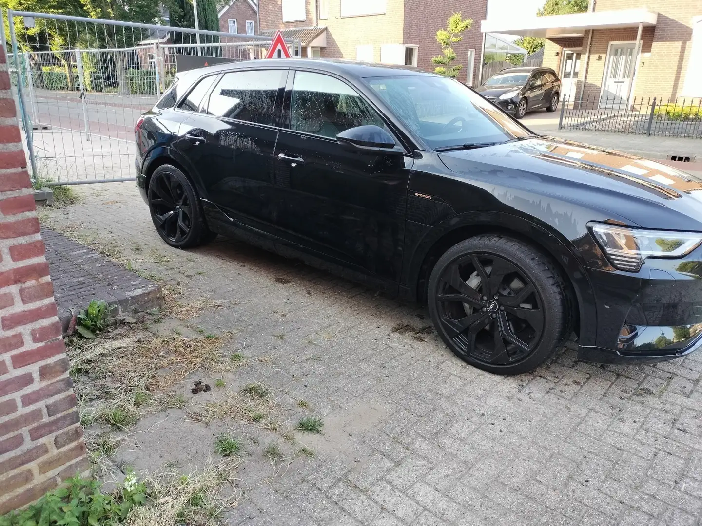 Audi e-tron 55 q. advanced Zwart - 1