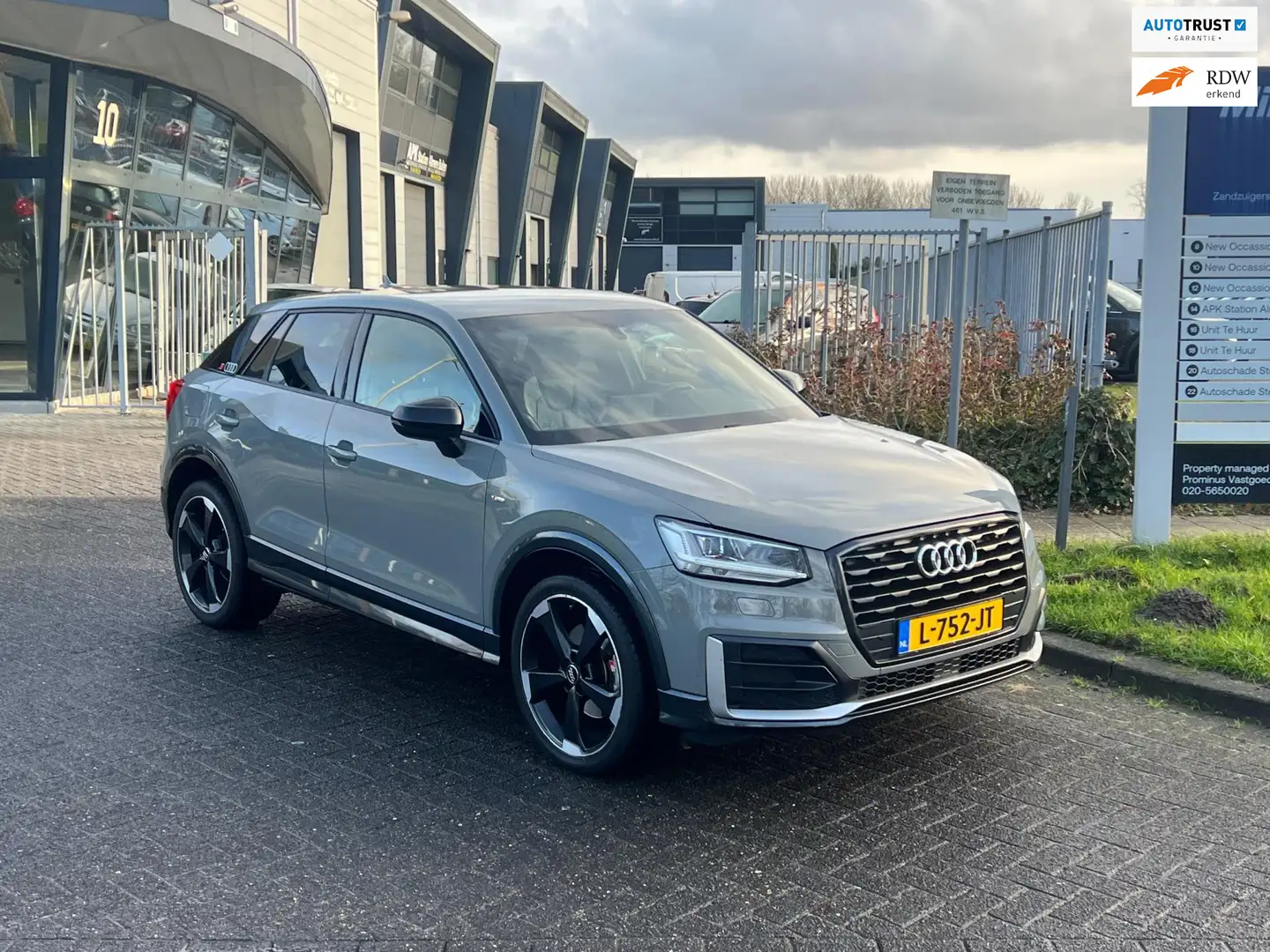 Audi Q2 1.4 TFSI CoD S-Line Edition DSG-7 LED Grijs - 1
