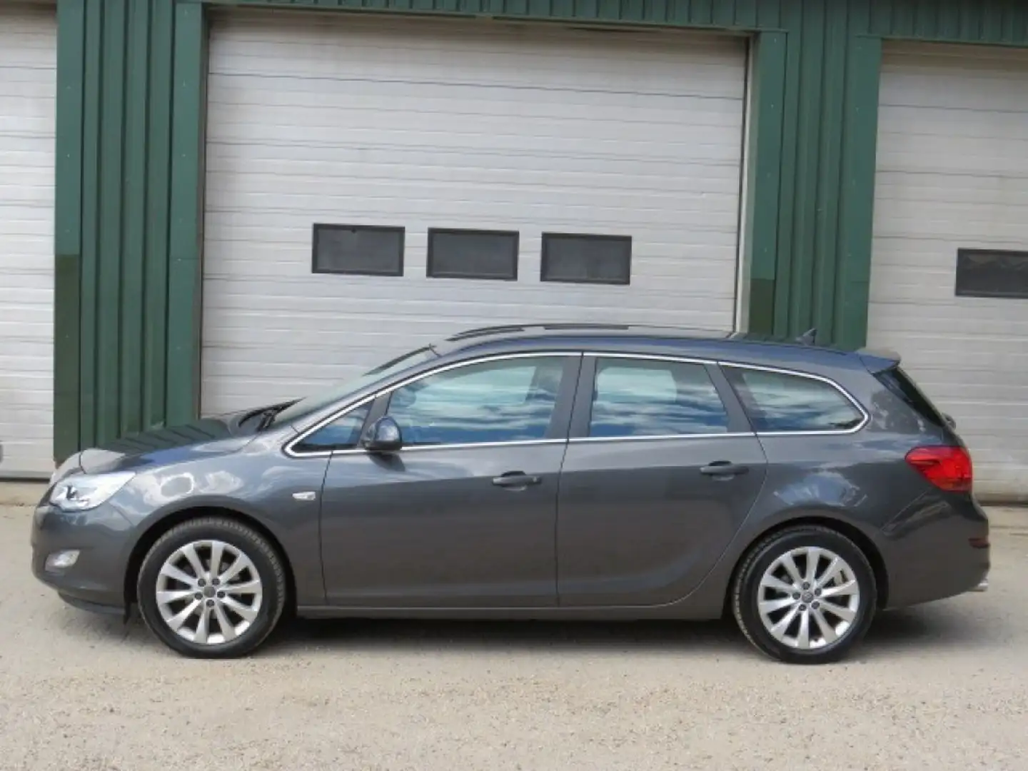 Opel Astra 1.4 Turbo Anniversary Edition Grijs - 1