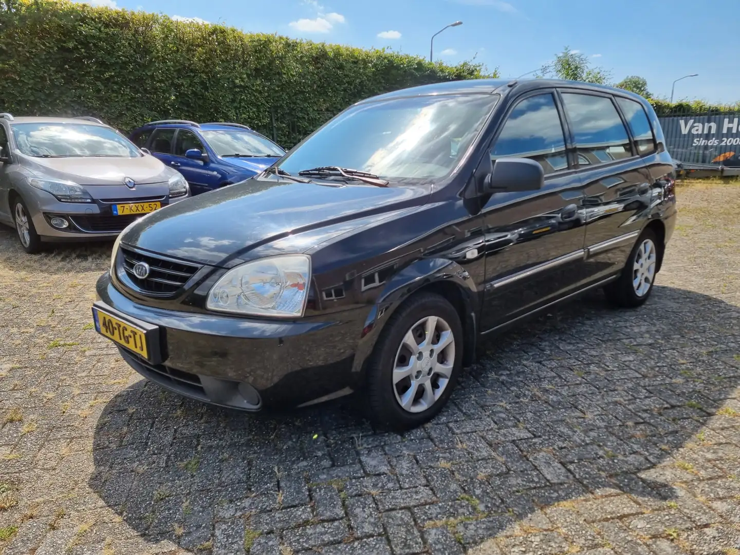 Kia Carens 2.0 CVVT M-bition ✅APK MEI 2025!! Zwart - 1
