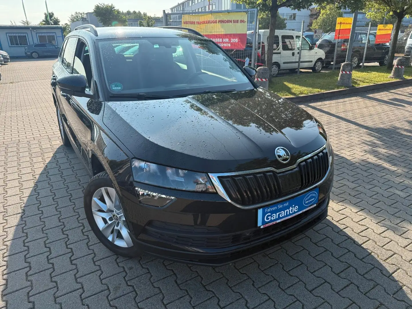 Skoda Karoq 1.5 TSI DSG STYLE*NAVI*PDC+*KAMERA*ACC*17Z Schwarz - 1