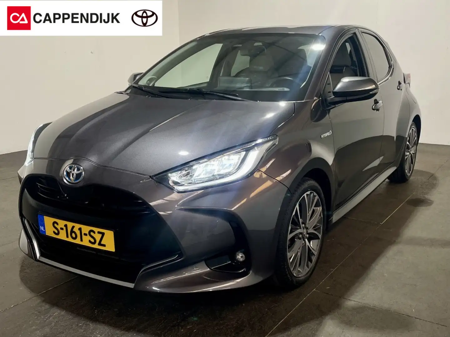 Toyota Yaris 1.5 Hybrid Executive | LEER | HEAD-UP DISPLAY | BS Grijs - 1