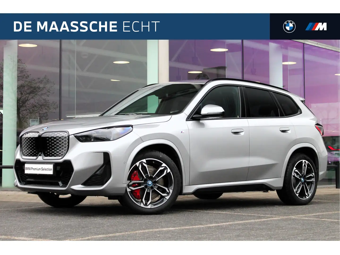 BMW iX1 eDrive20 High Executive M Sport / Panoramadak / Tr Zilver - 1