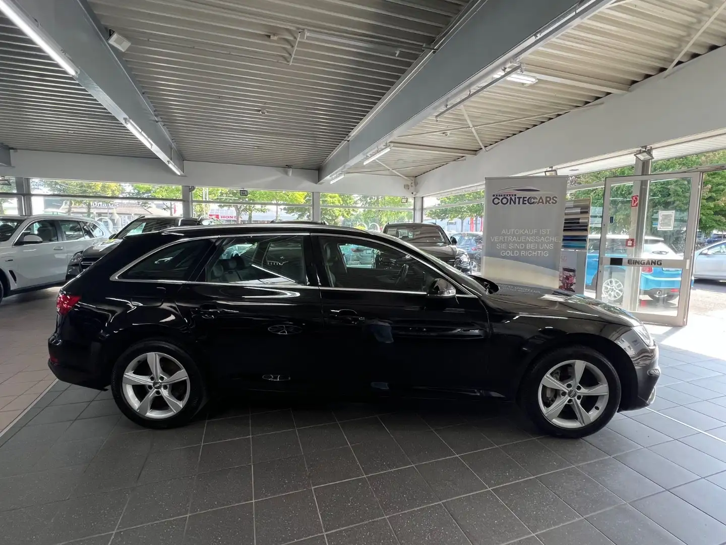 Audi A4 Avant 40 TDI Sport AHK+Tour+Milano+DSP+MMI Zwart - 1