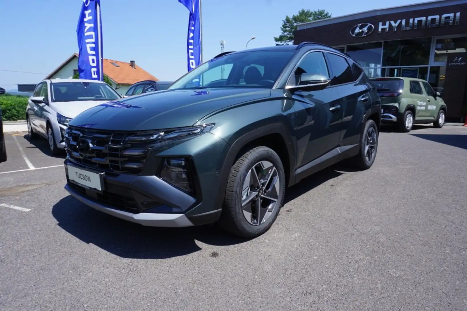 Hyundai TUCSON NX4 Comfort Line 1,6 T-GDi HEV 2WD AT t7hc1-P22/23-O20 Grün - 1