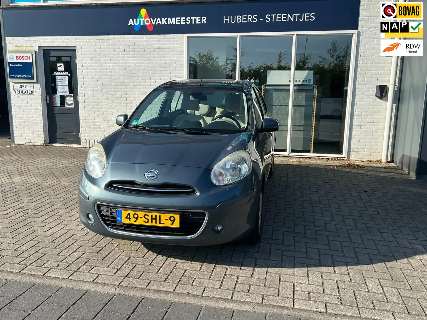 Nissan Micra 1.2 DIG-S Tekna Grijs - 1