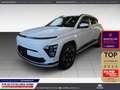 Hyundai KONA 65,4 kWh Prime 98,9% SOH Sitz-Komfort-Paket Weiß - thumbnail 1