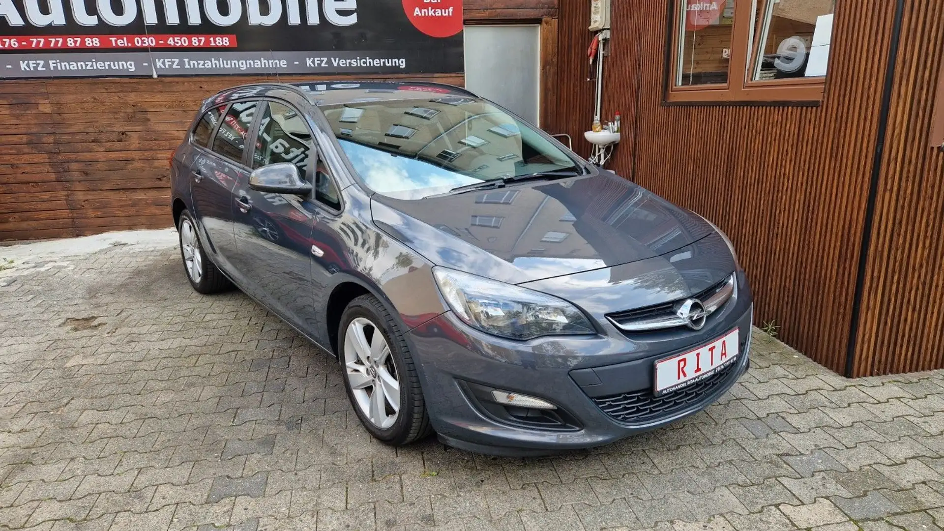 Opel Astra J Sports Tourer Style, 1 Hand Grau - 1
