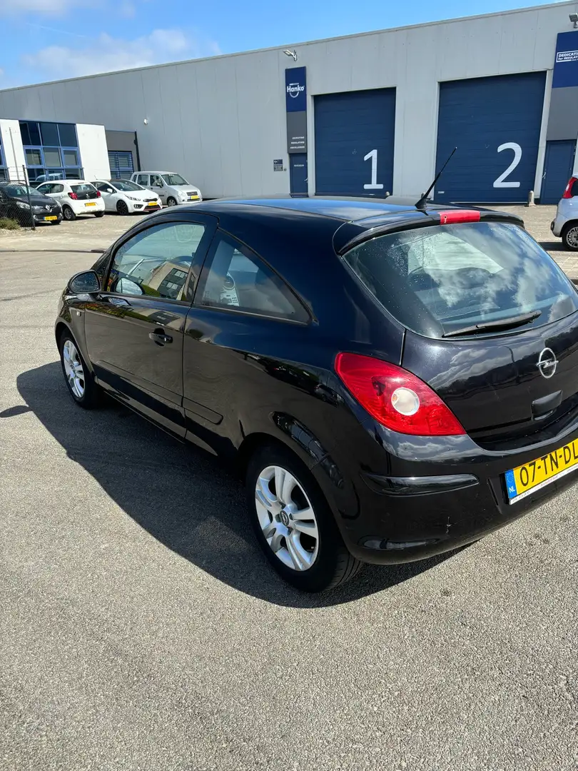 Opel Corsa 1.2-16V Enjoy Zwart - 2