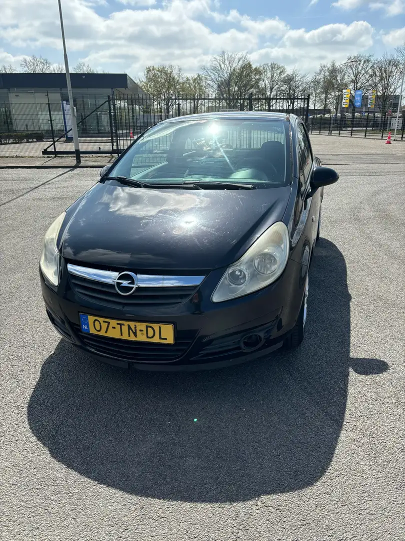 Opel Corsa 1.2-16V Enjoy Zwart - 1