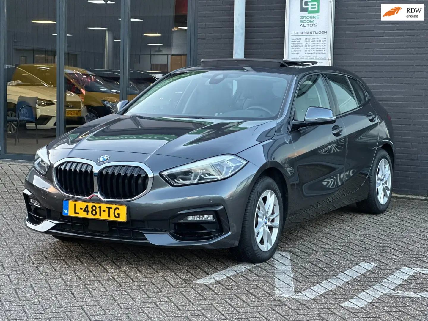 BMW 118 1-serie 118i High Executive/PANO-DAK/APP-CONNECT/N Grijs - 1