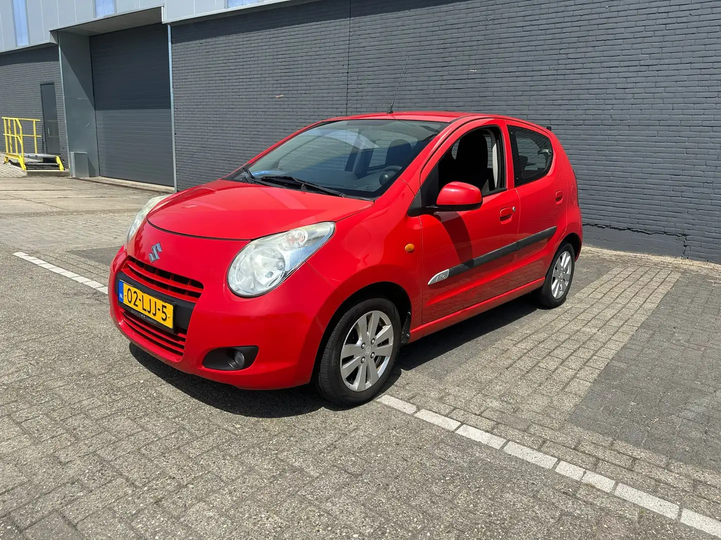 Suzuki Alto 1.0 Exclusive Rood - 1