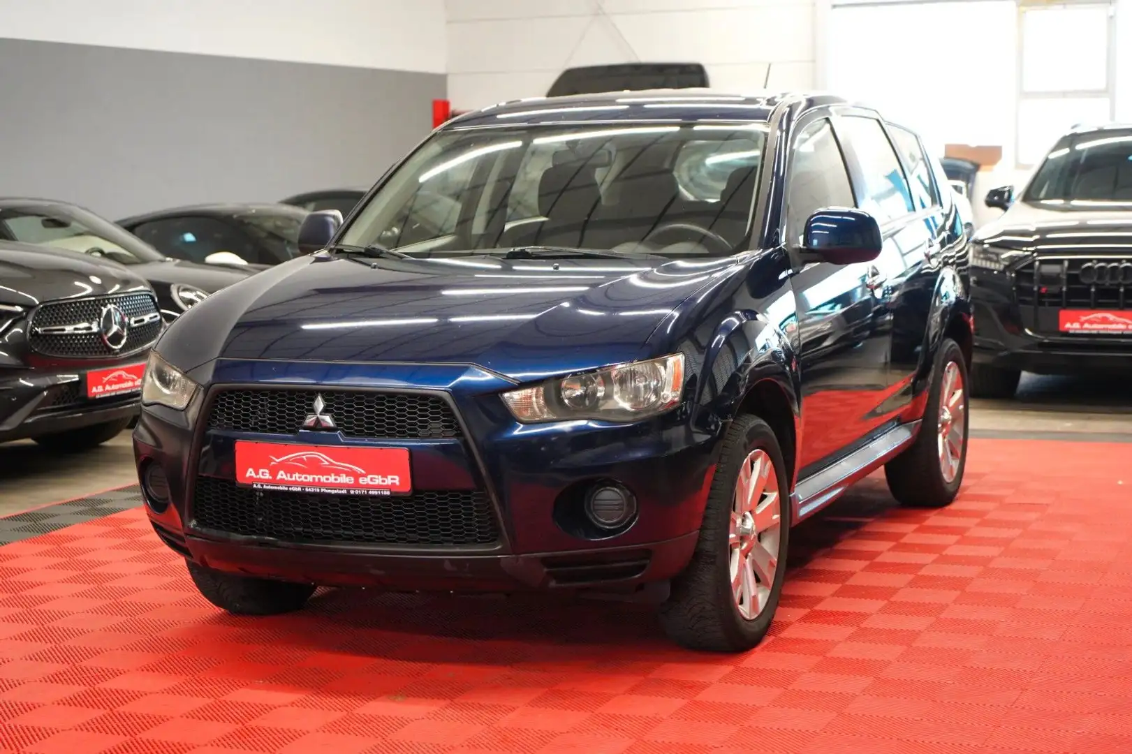 Mitsubishi Outlander 2.0 2WD 2.Hand*Klimaaut*Sitzh*AUX* Blau - 1