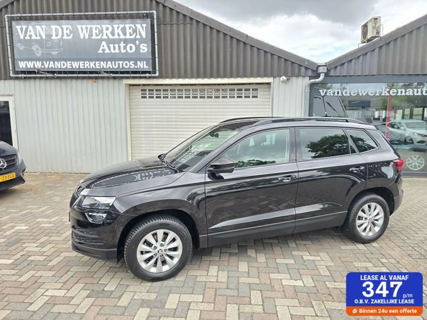 Skoda Karoq 1.5 TSI ACT Business Edition AUTOMAAT Clima|Navi|C Zwart - 1