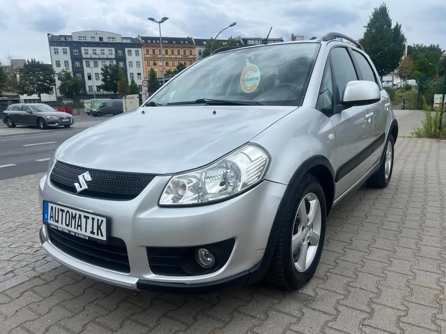 Suzuki SX4 Streetline Club,Automatik,Klima,SHZ,PDC,Allwetter Grau - 2
