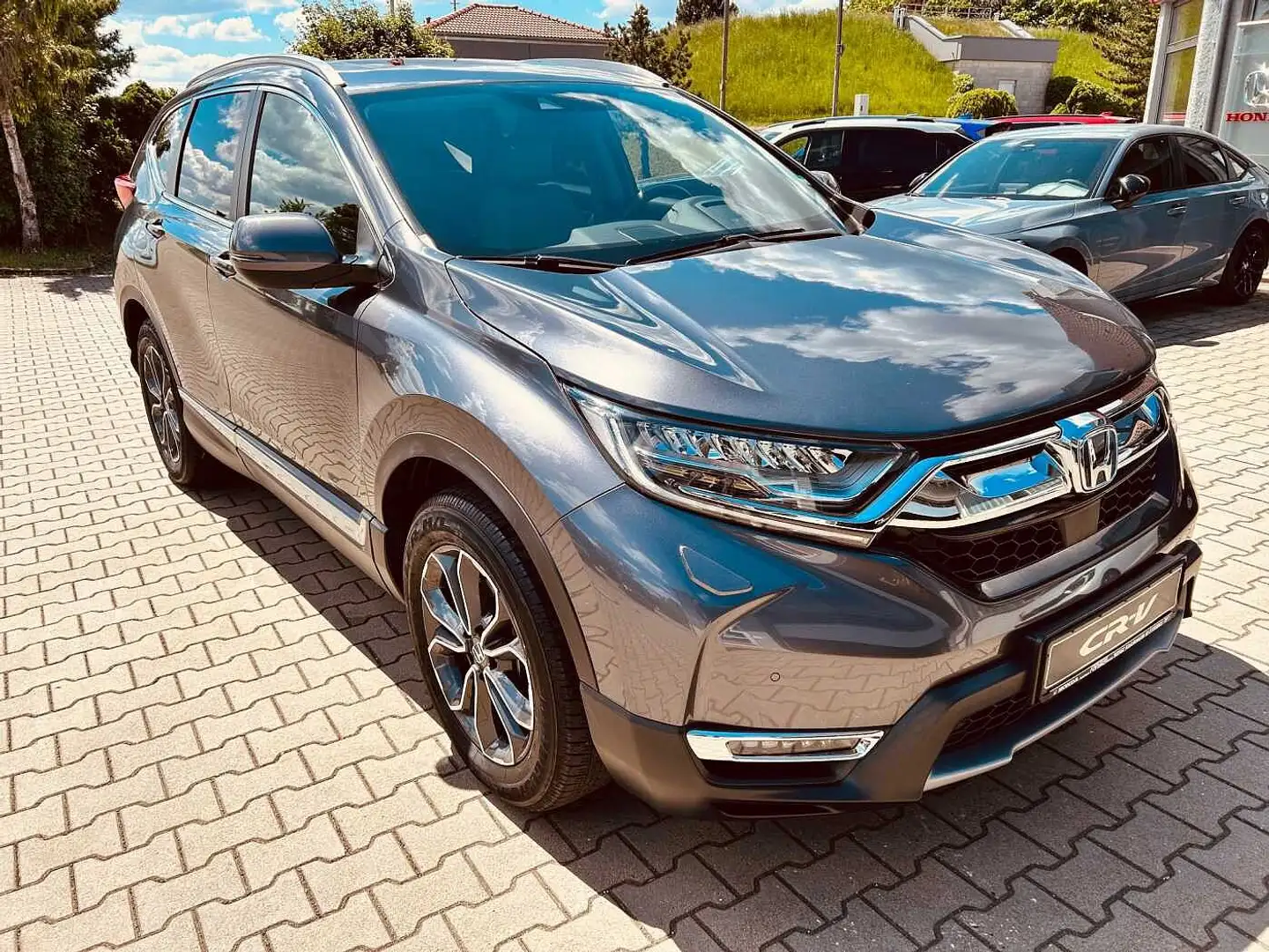 Honda CR-V Hybrid e:HEV 2.0 i-MMD 4WD Executive Grijs - 1
