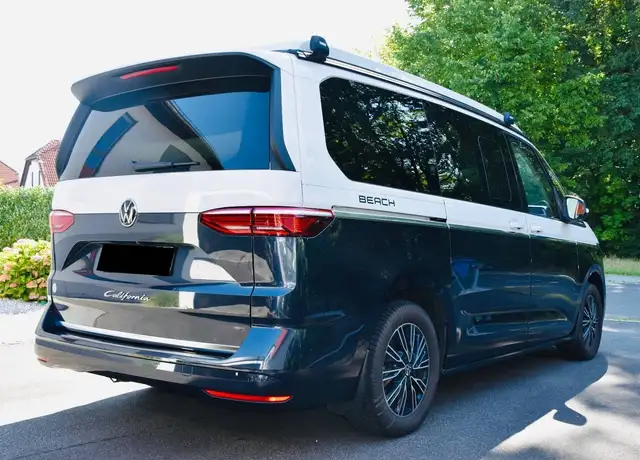Volkswagen T7 California 2.0 TDI Beach Camper - Foto con coprisedili