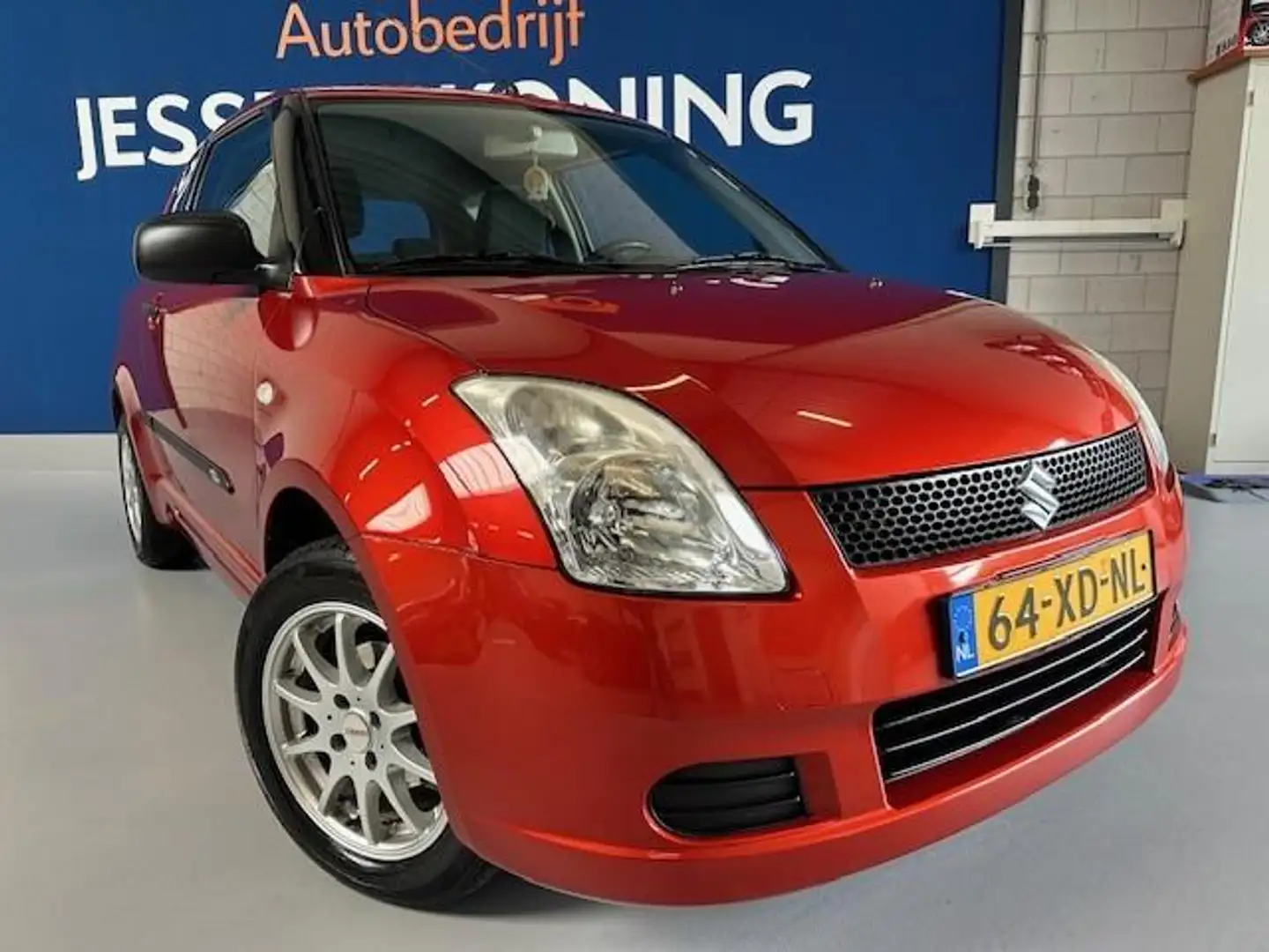 Suzuki Swift 1.3 GA,bj.2007,kleur:rood,sportvelgen,NAP met 6433 Oranje - 2