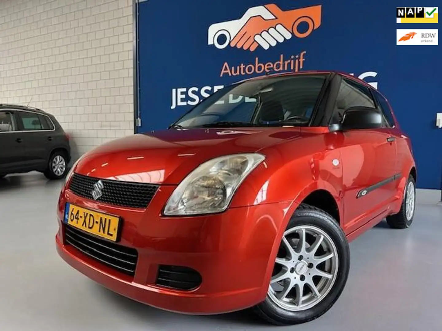 Suzuki Swift 1.3 GA,bj.2007,kleur:rood,sportvelgen,NAP met 6433 Oranje - 1