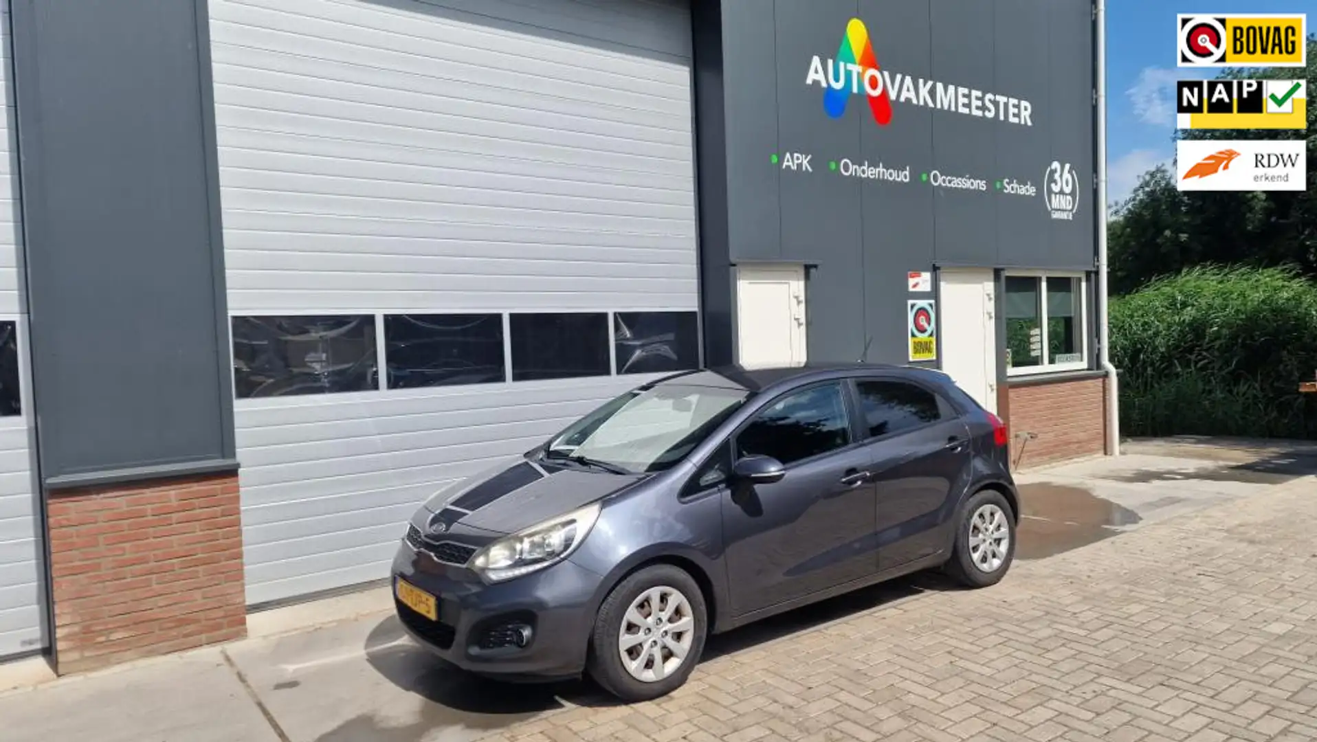 Kia Rio 1.2 CVVT Super Pack Grijs - 1