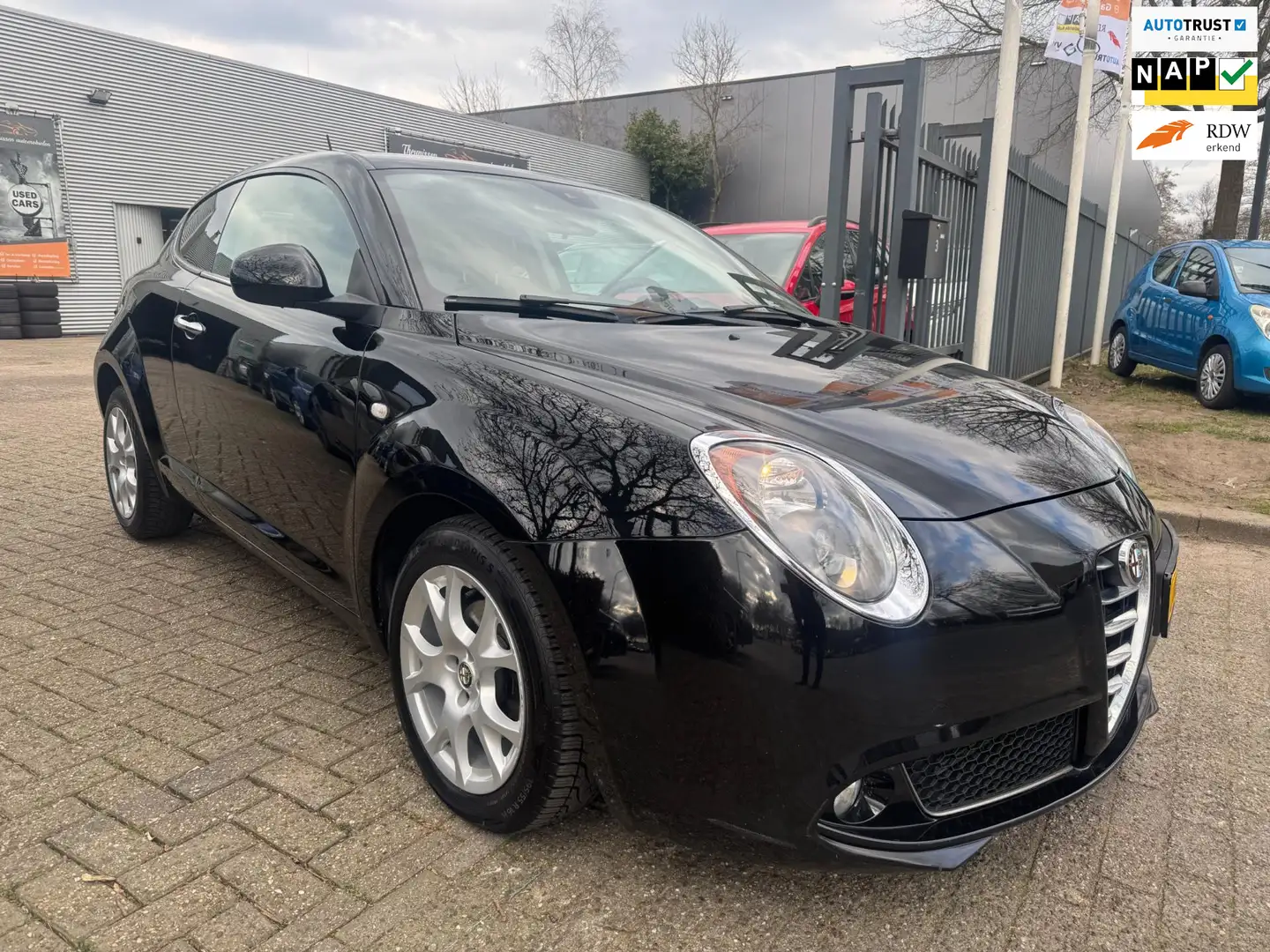 Alfa Romeo MiTo 1.4 T Distinctive automaat navi cruise, elec pakke Zwart - 1