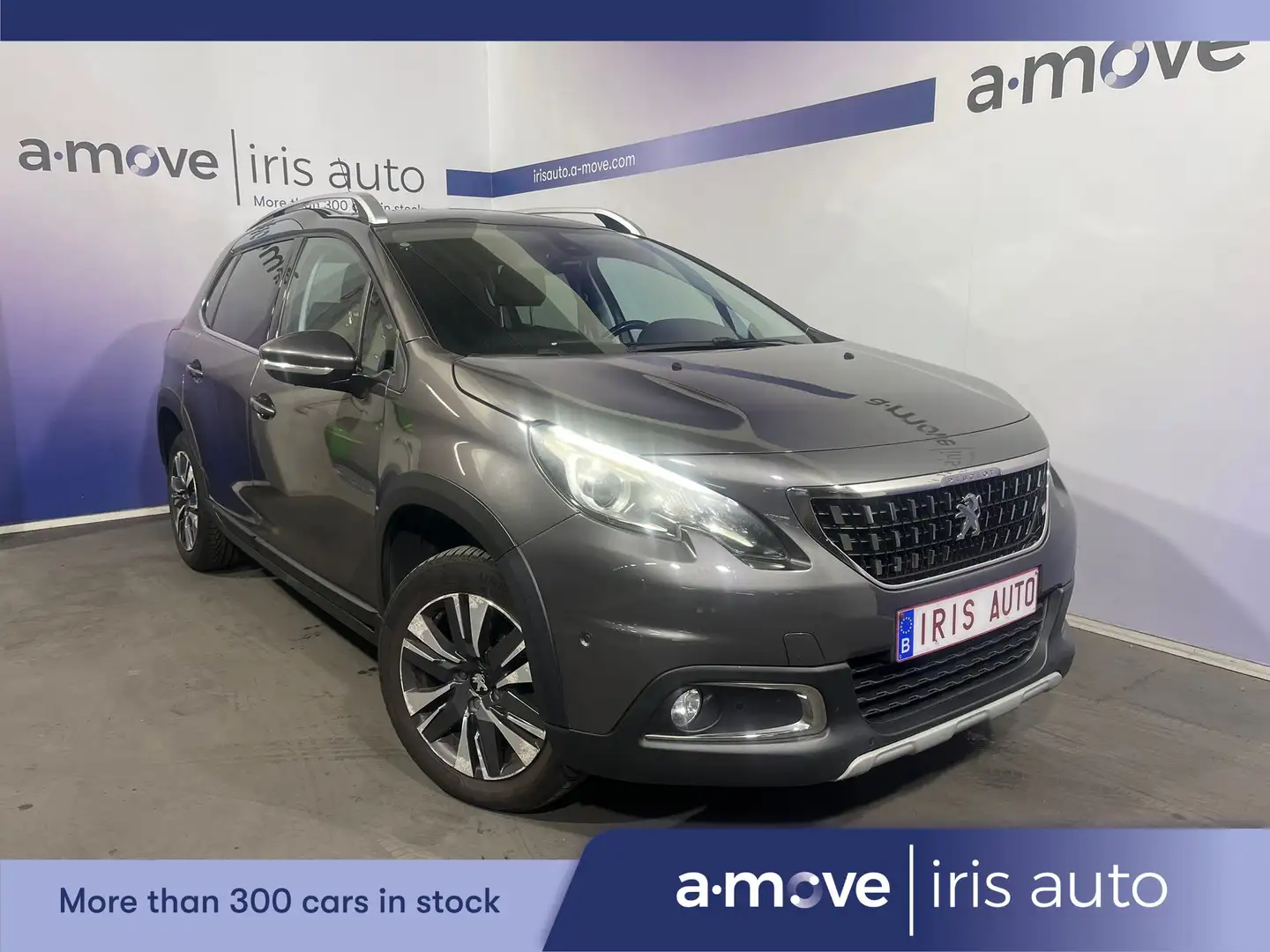 Peugeot 2008 1.2 PURETECH | CARPLAY | TOIT PANO. | AC. Grijs - 1