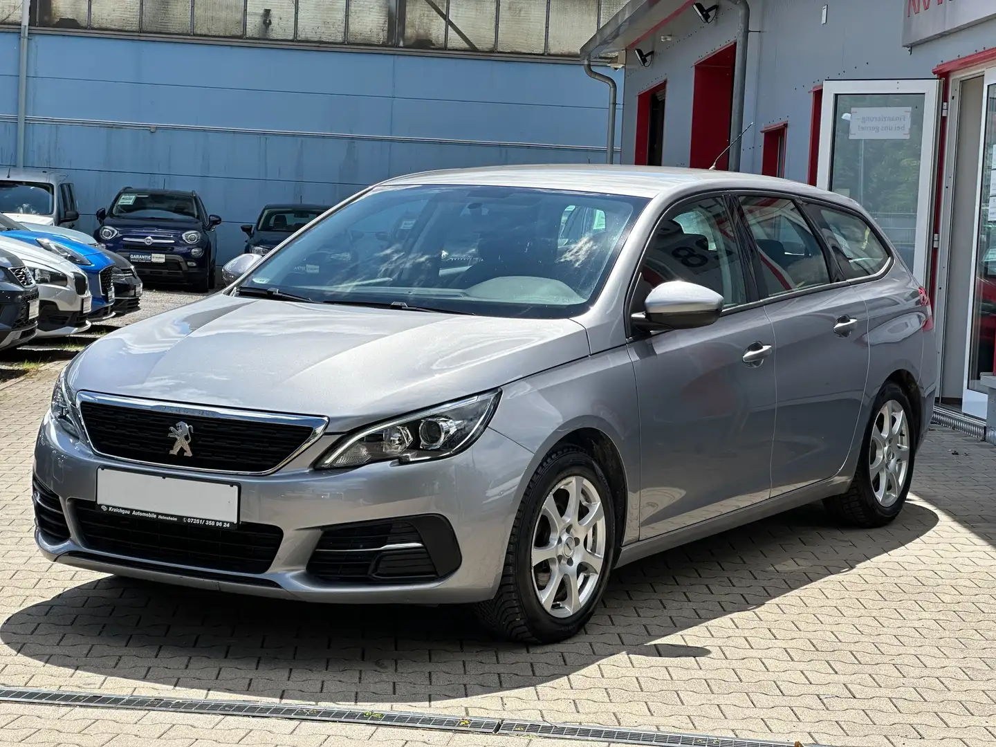 Peugeot 308 SW 1.5 BlueHDI*TüV Neu*AHK*Navi*Tempo*Klimaauto Grau - 1