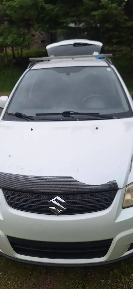 Suzuki SX4 photo Suzuki SX4
