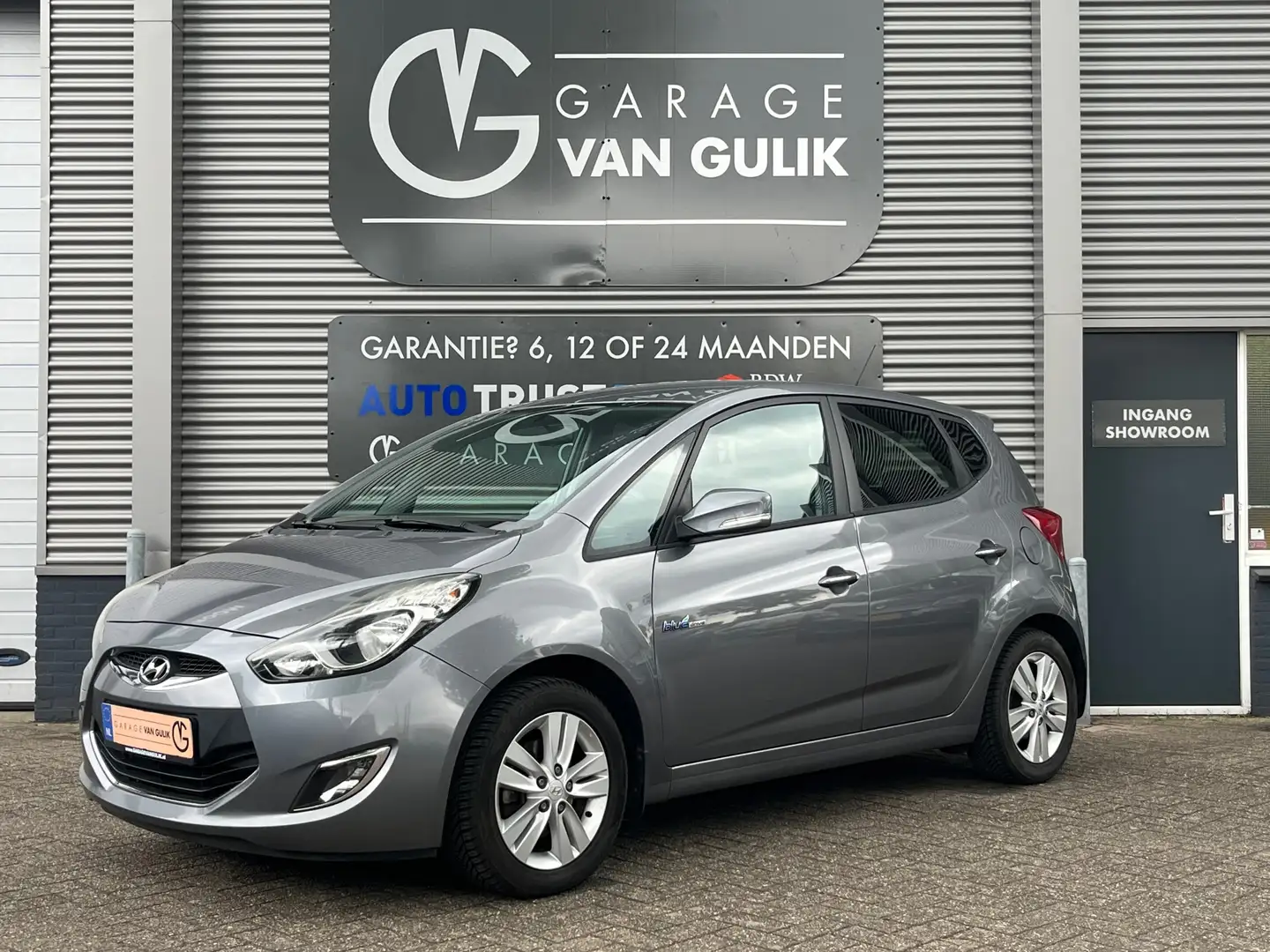 Hyundai iX20 1.4i 90PK i-Vision Clima,Cruise,Navi,AchteruitrijC Gris - 1
