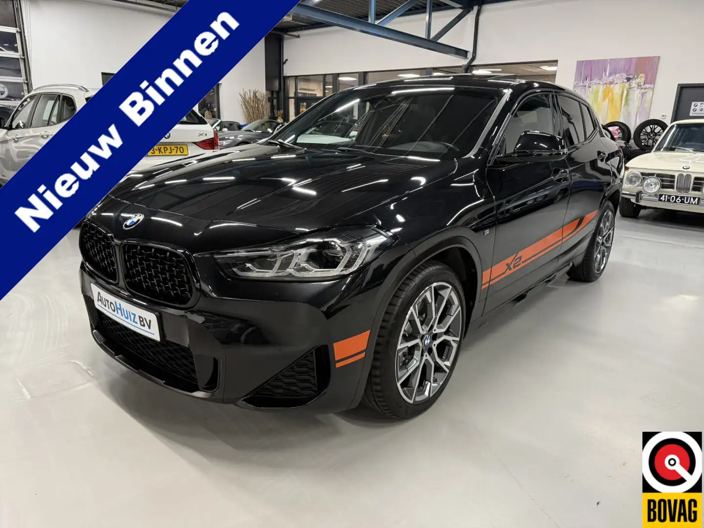 BMW X2 sDrive20i High Executive M Sport Mesh Edition Pano Zwart - 1