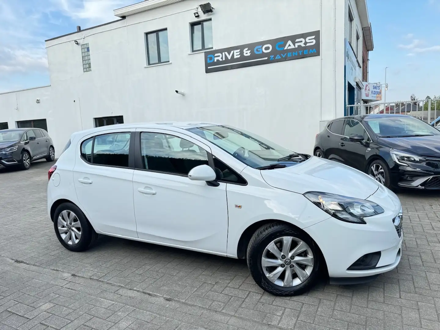Opel Corsa 1.0 Turbo - Airco - CarPlay ** 1 JAAR GARANTIE ** Wit - 1
