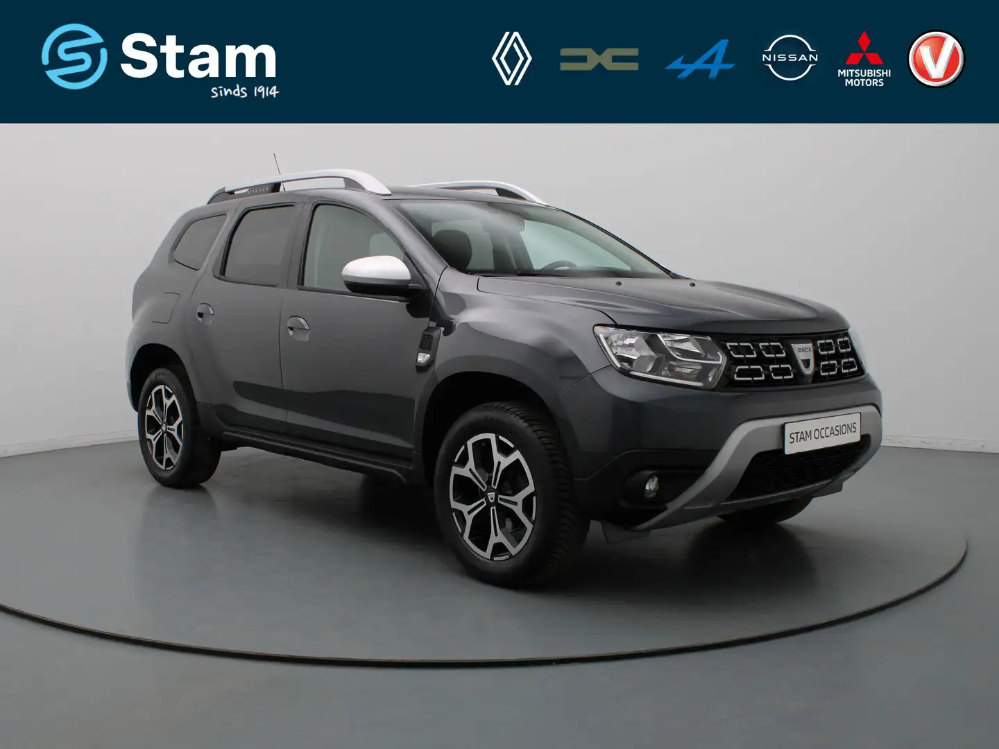 Dacia Duster 100pk TCe Bi-Fuel Prestige 360° Camera | Cruise | Grijs - 1