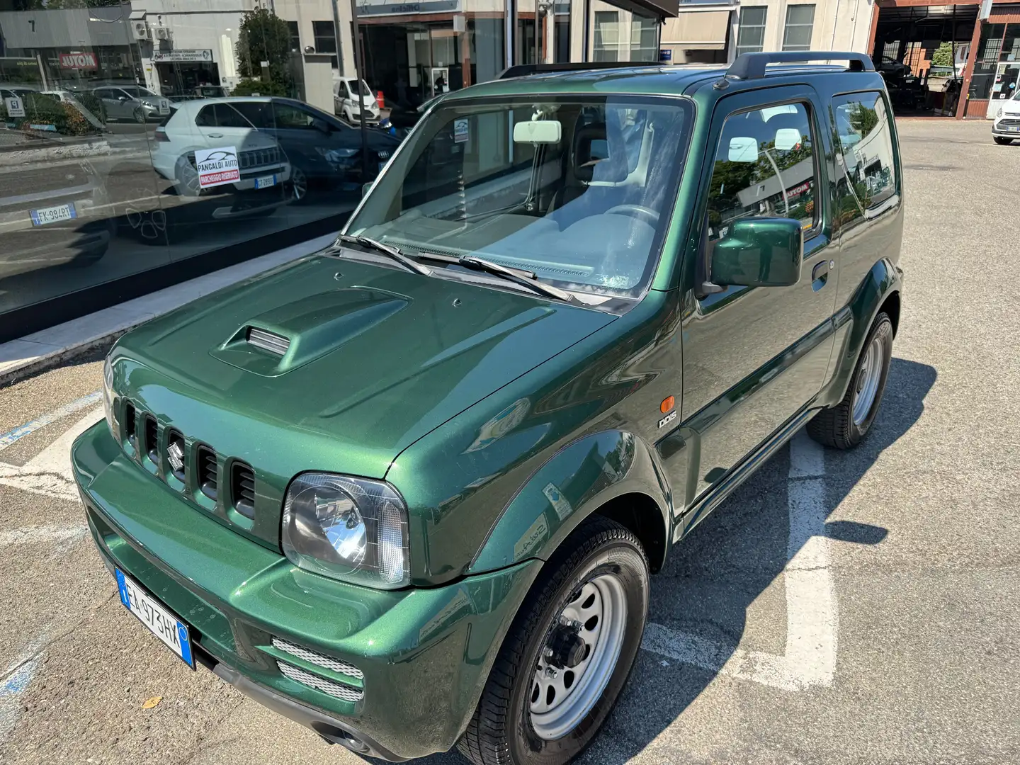 Suzuki Jimny 1.5 ddis JLX 4wd,CLIMA,RADIO CD,TELECOMAN Verde - 1