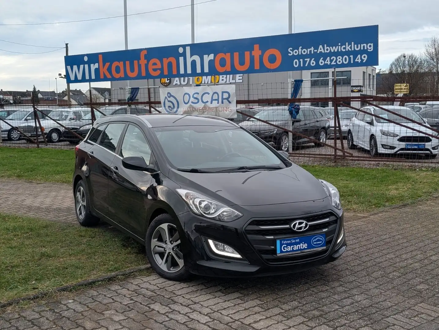 Hyundai i30 cw YES!*KLIMA*TEMPOMAT*PDC*USB* Schwarz - 1