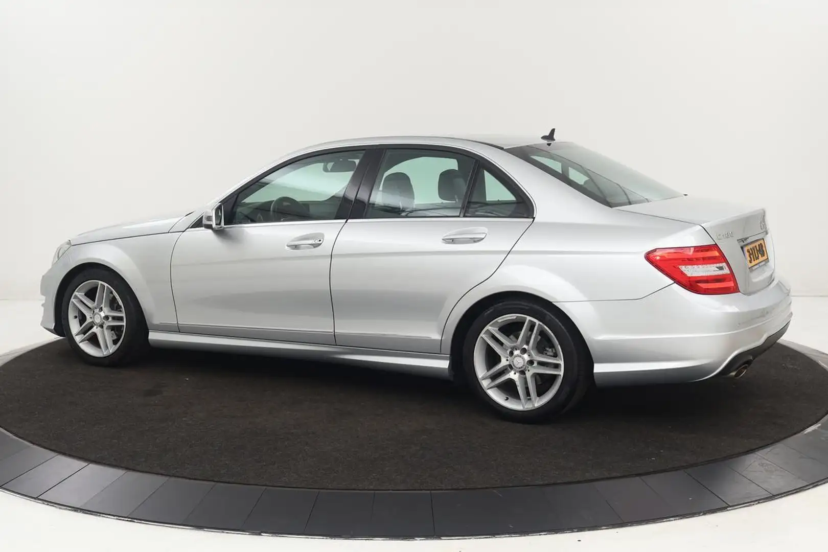 Mercedes-Benz C 180 AMG Sport | Stoelverwarming | Xenon | Half leder | Gris - 2