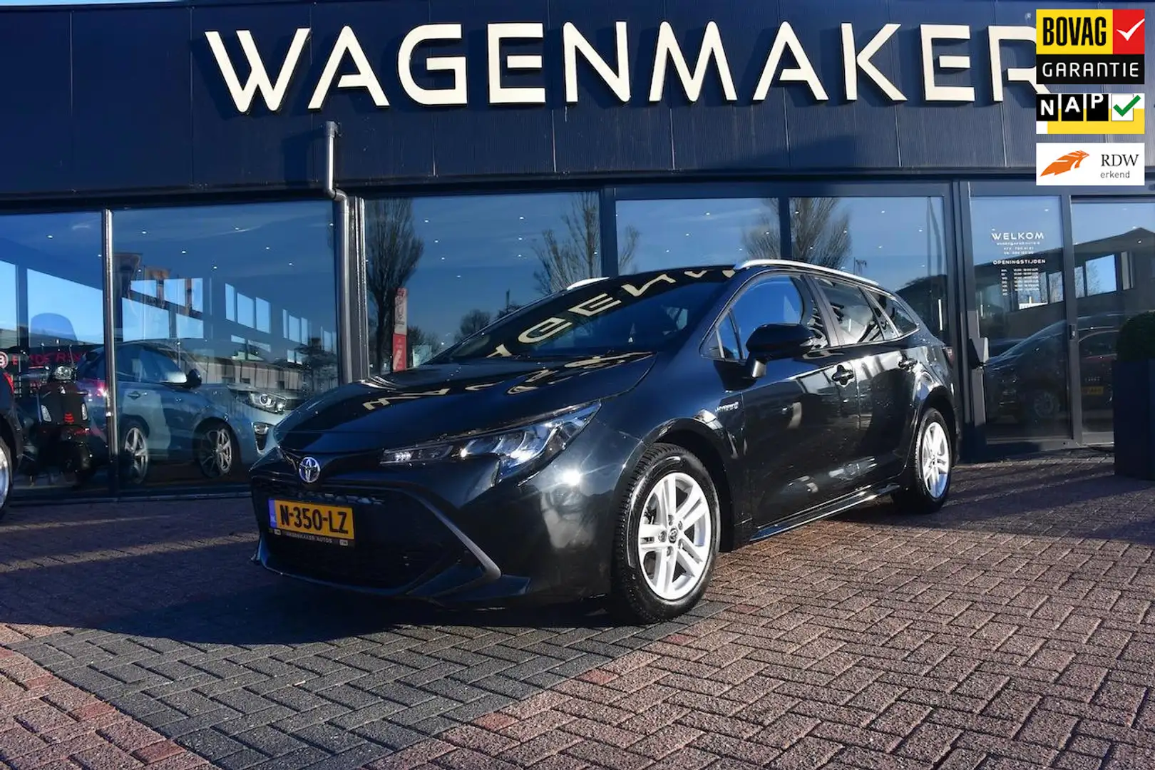Toyota Corolla Touring Sports 1.8 Hybrid Active AUT|ACC|CAM Zwart - 1