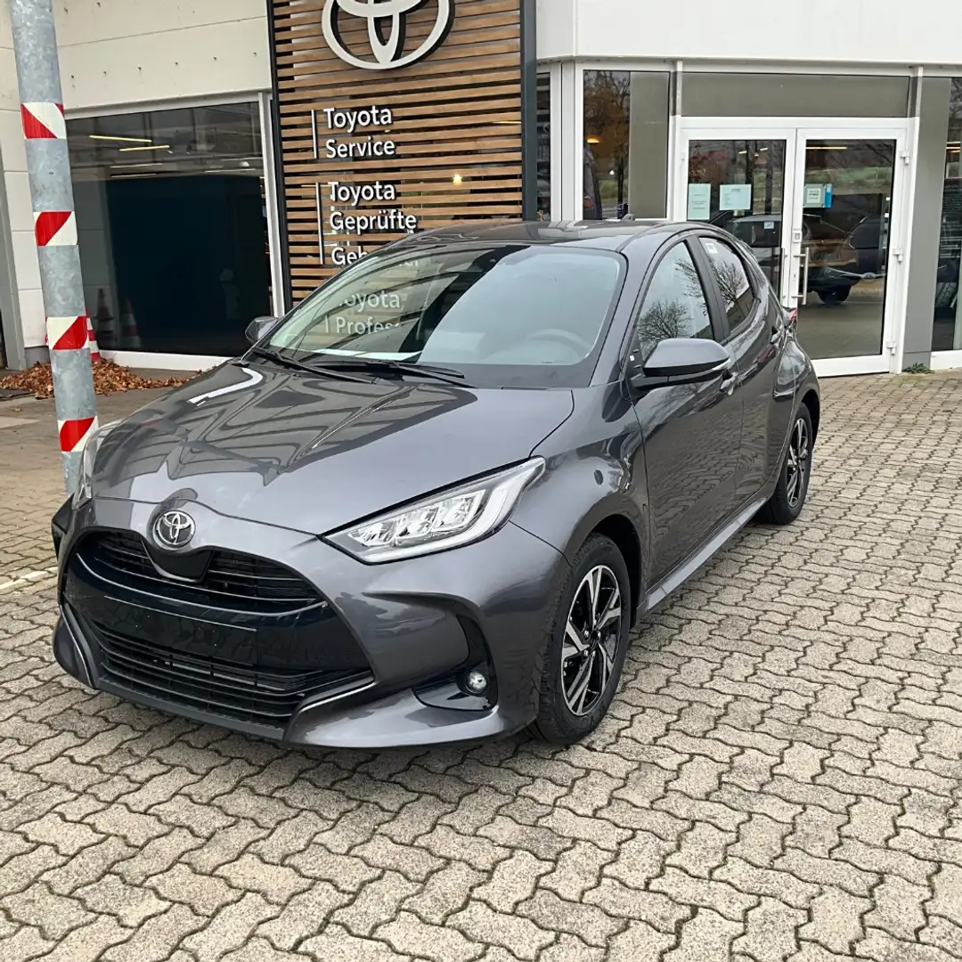 Toyota Yaris 1.5l Hybrid Klimaautomatik, Kamera, BT Gris - 1