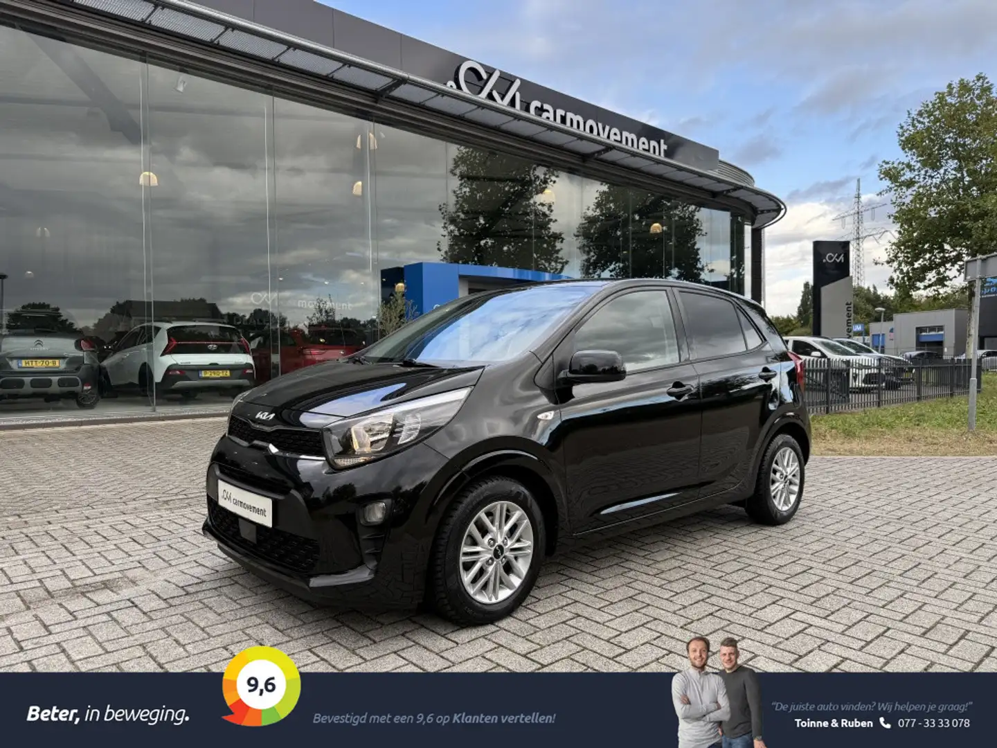 Kia Picanto 1.0 DPi DynamicLine Dream Team | 1ste Eig. | Navi Noir - 1