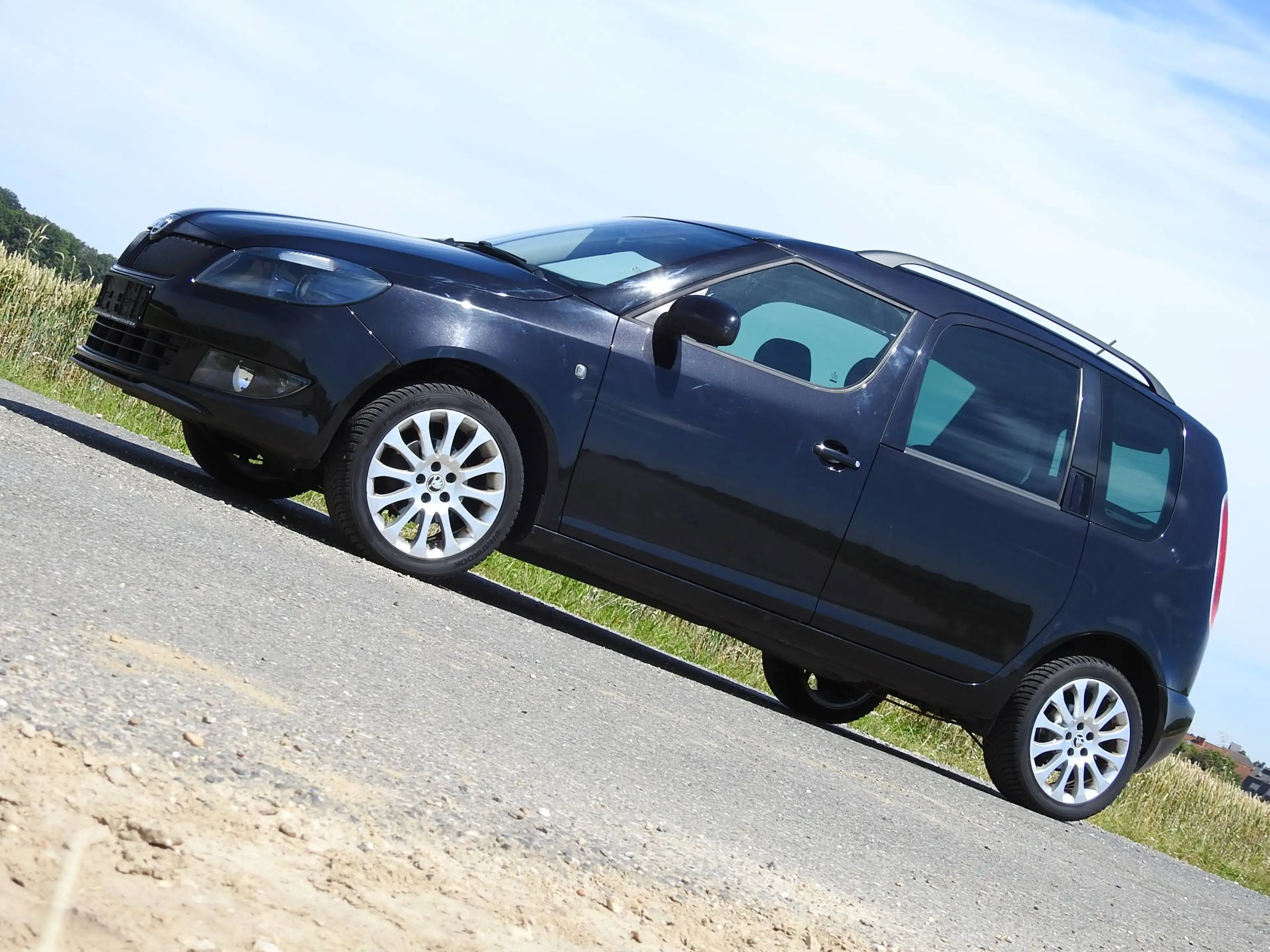 Skoda Roomster 1.2 TSI . Klima. Ganzjahresreifen. Sitzheizung! — photo 18