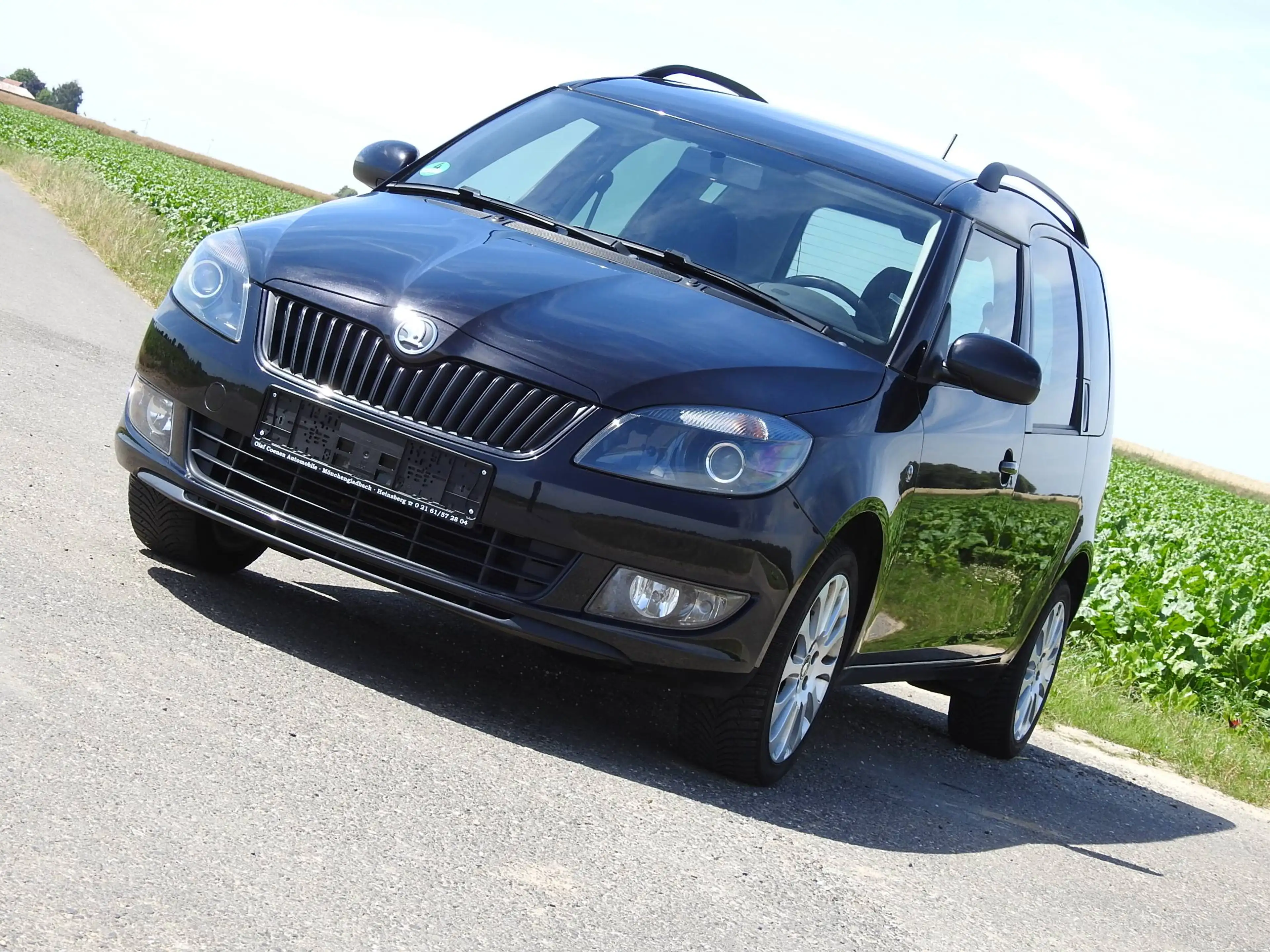 Skoda Roomster 1.2 TSI . Klima. Ganzjahresreifen. Sitzheizung! — photo 34