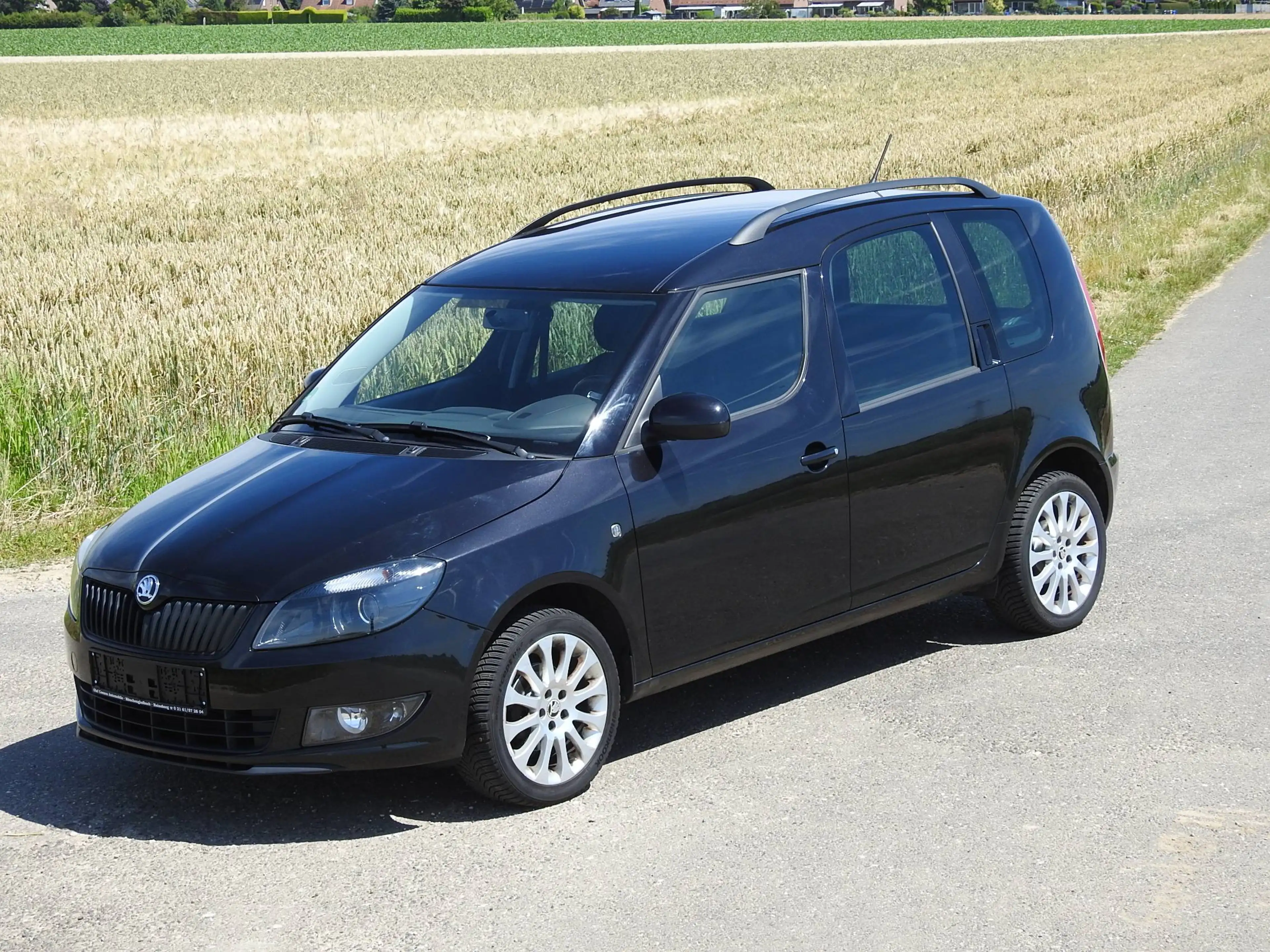 Skoda Roomster 1.2 TSI . Klima. Ganzjahresreifen. Sitzheizung! — photo 36