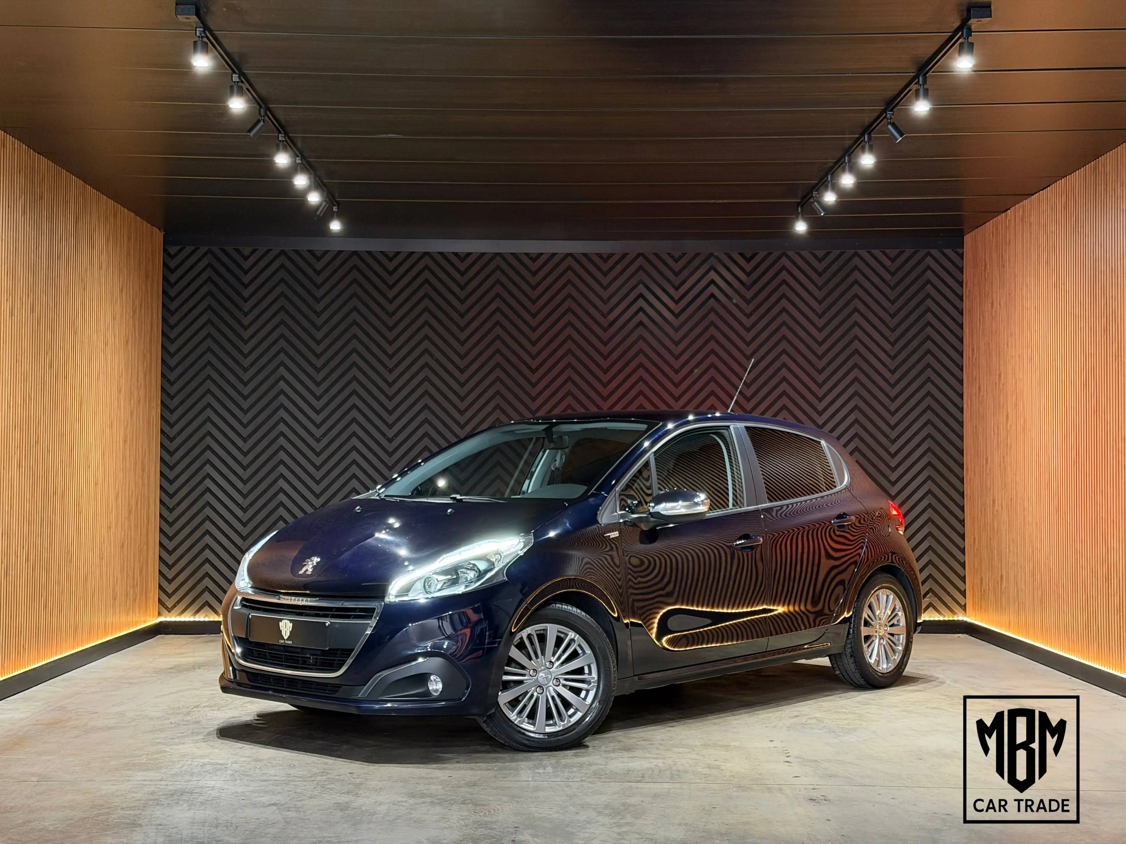 Peugeot 208 ✅1.2i 12 Maanden GARANTIE Airco Navi Parkeersensoren
