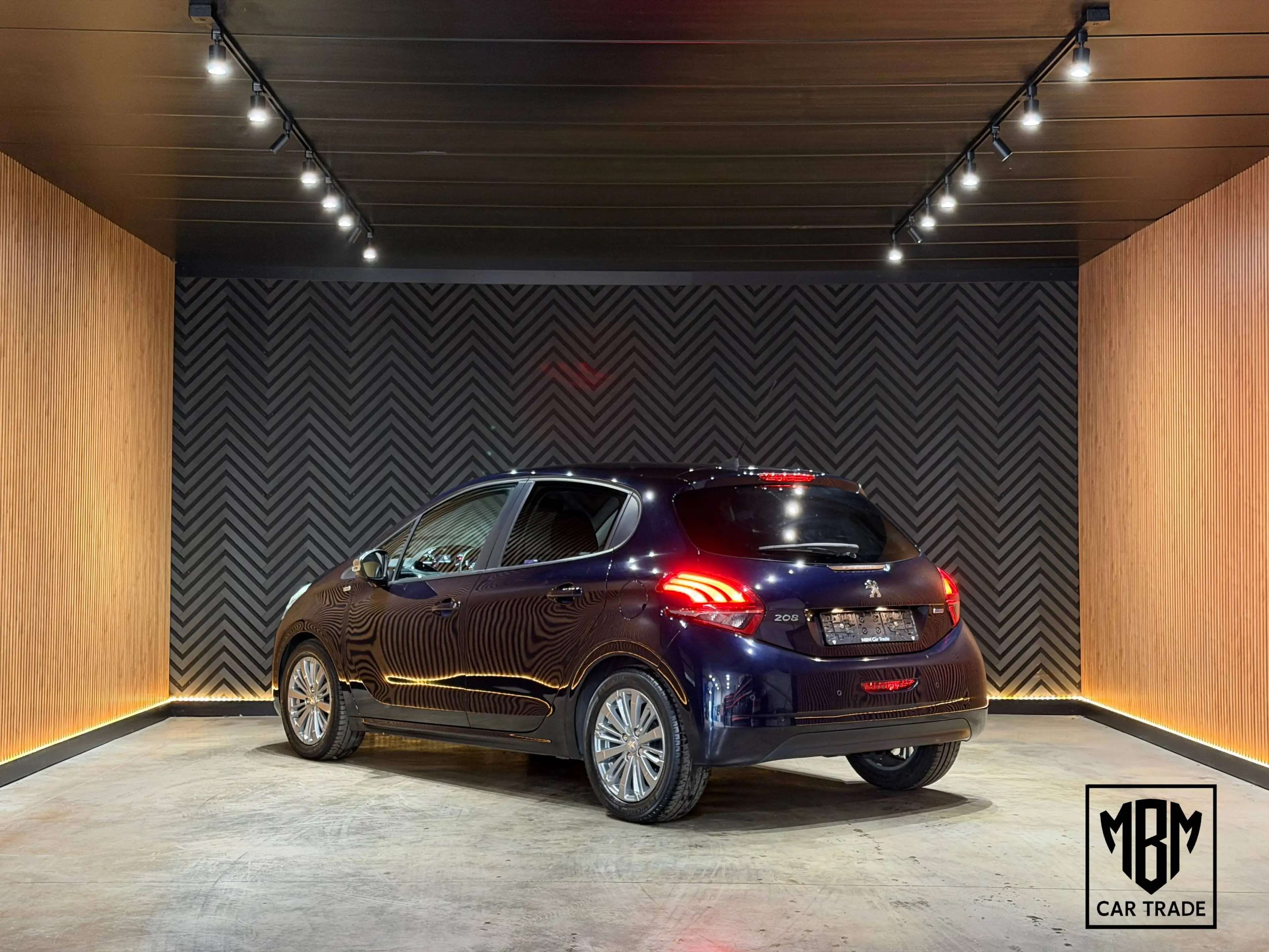 Peugeot 208 ✅1.2i 12 Maanden GARANTIE Airco Navi Parkeersensoren — photo 2