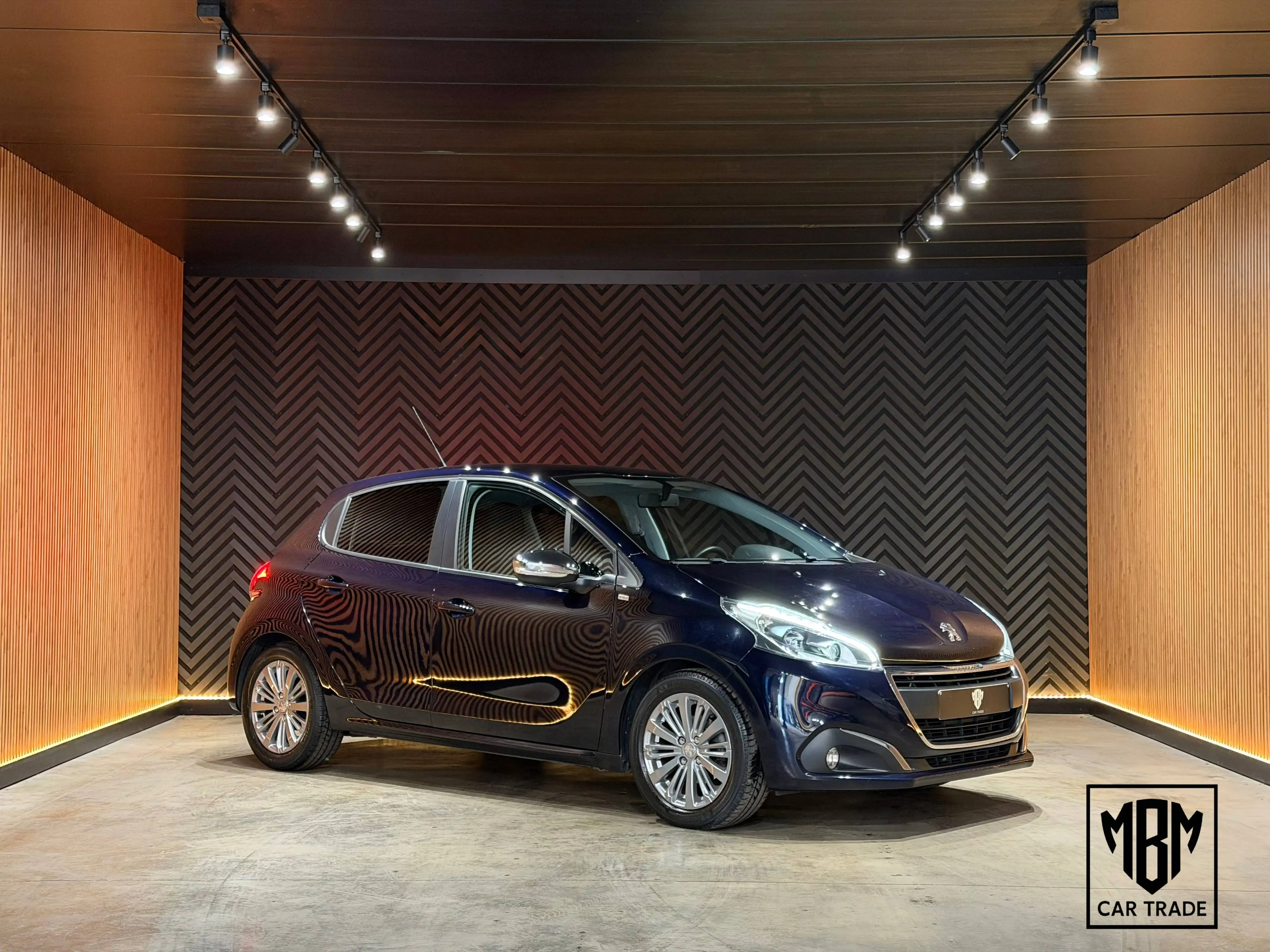 Peugeot 208 ✅1.2i 12 Maanden GARANTIE Airco Navi Parkeersensoren — photo 5