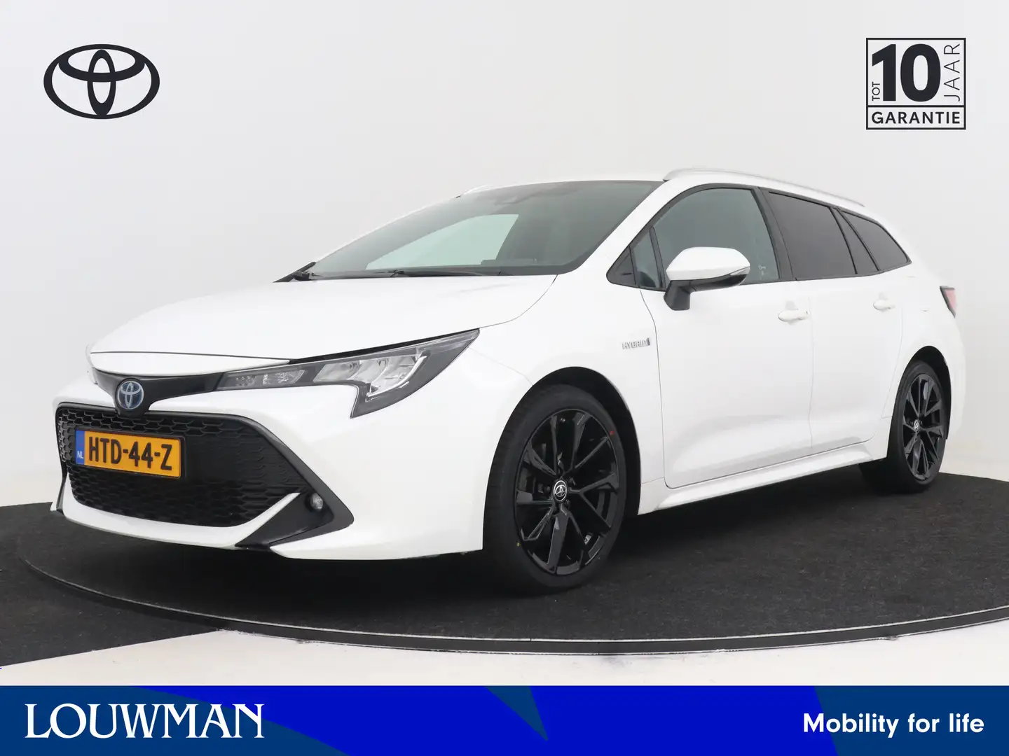 Toyota Corolla Touring Sports 1.8 Hybrid Active Luxury | Stoel -/ Wit - 1