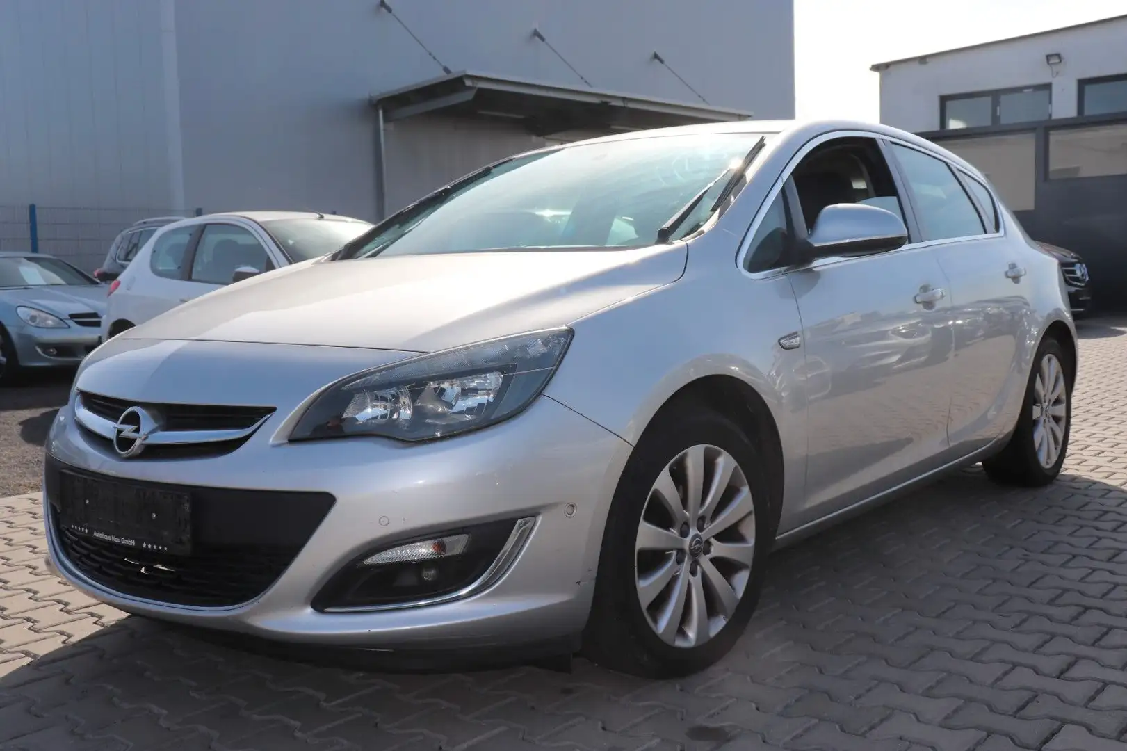 Opel Astra J Lim. 5-trg. Exklusiv Argent - 1