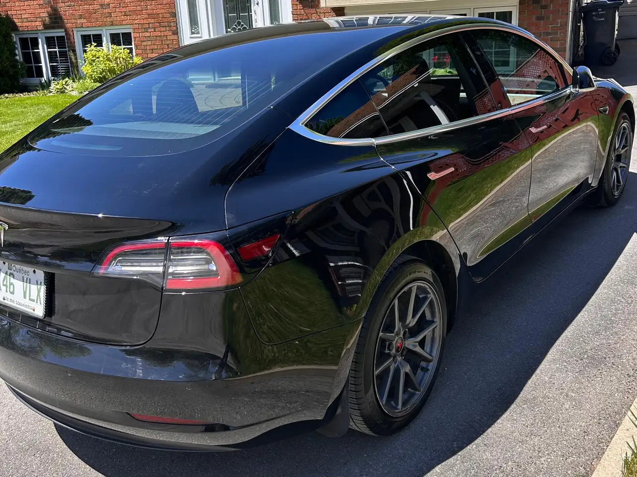 Tesla Model 3 photo Tesla Model 3