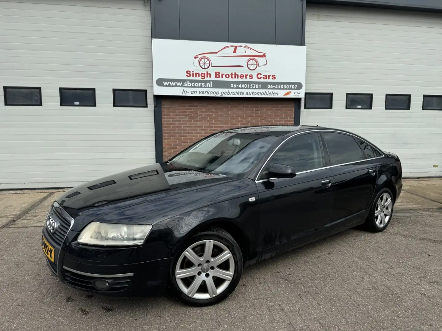 Audi A6 Limo 2.7 TDI q. Pro L. AUT LEER NAVI XENON Y-TIMER Zwart - 2