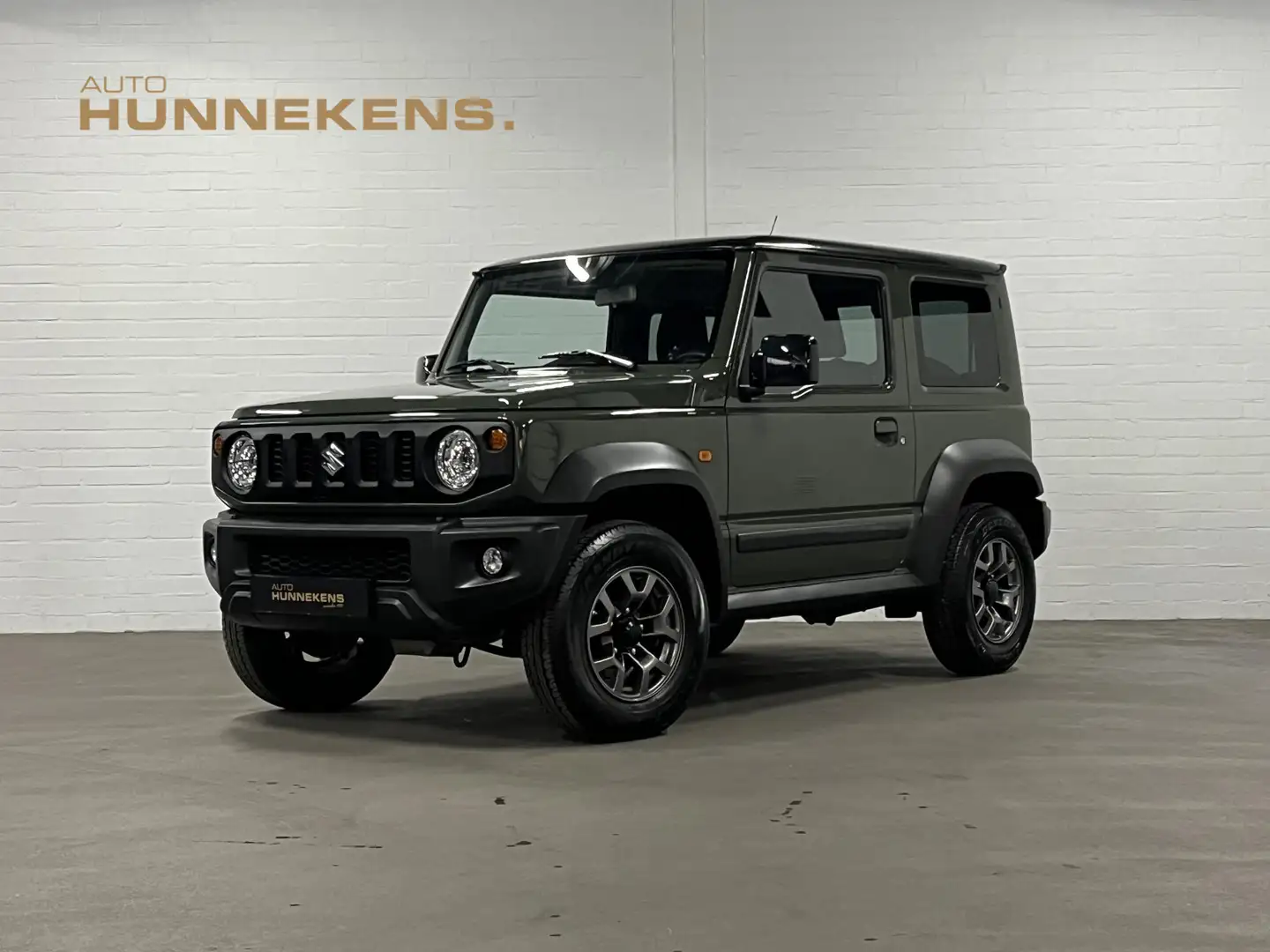 Suzuki Jimny 1.5 Stijl | trekhaak | cruise/climate control | st Groen - 1